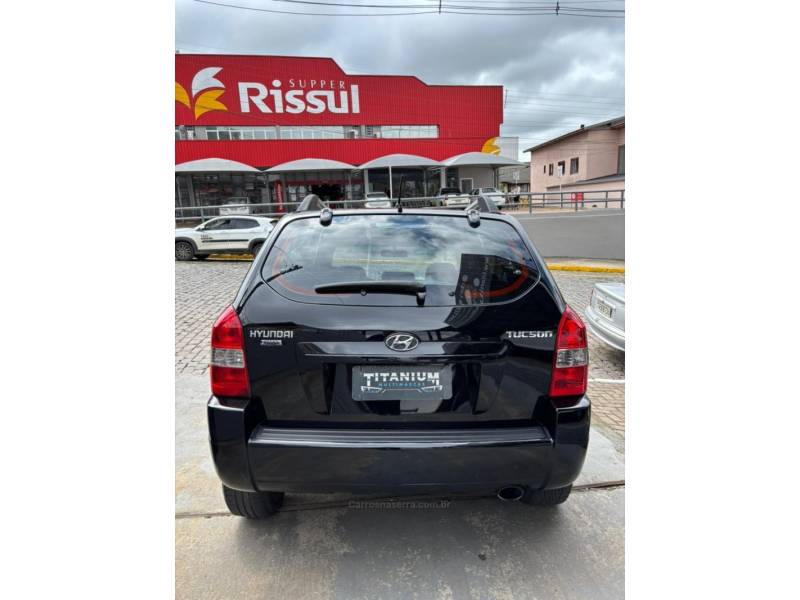 HYUNDAI - TUCSON - 2009/2010 - Preta - R$ 42.900,00