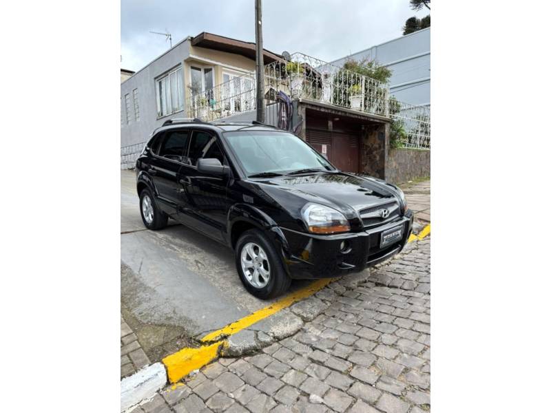 HYUNDAI - TUCSON - 2009/2010 - Preta - R$ 42.900,00